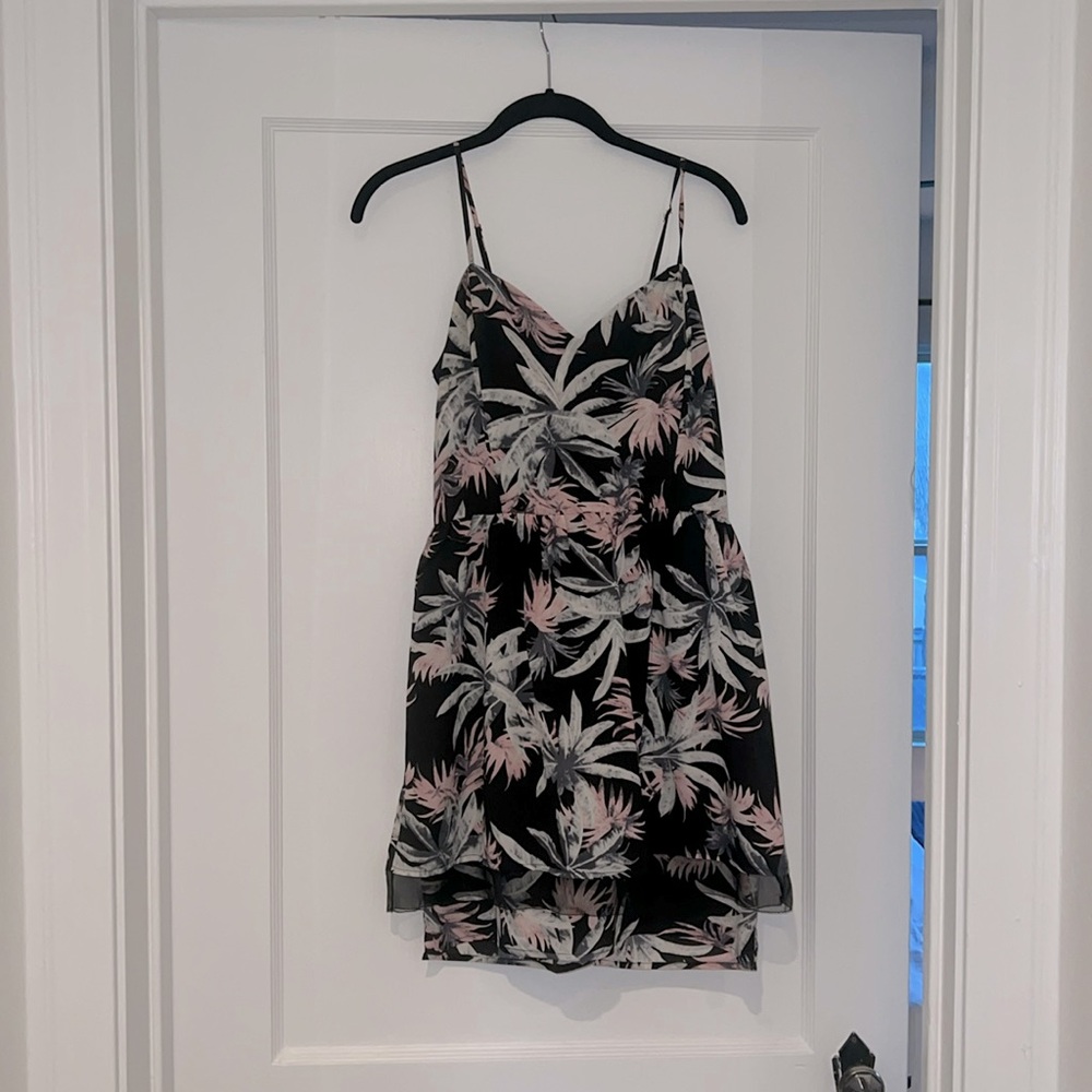 Black dress with pink & greenish/grey palm tree design.